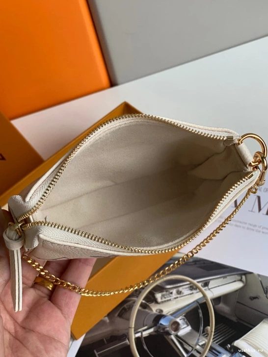 WIS LOUIS MINI VUITTON POCHETTE ACCESSOIRES 1023